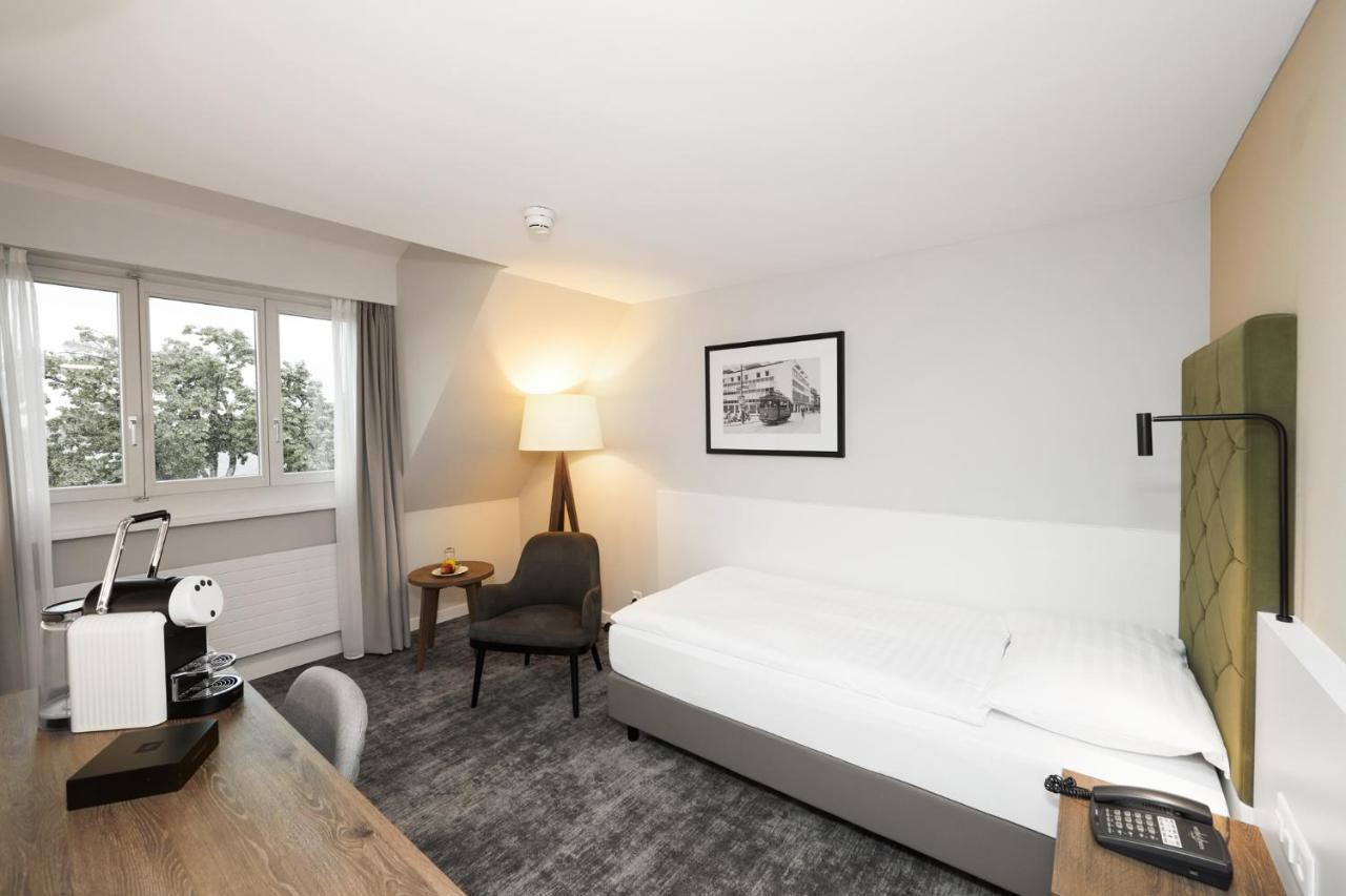 Hotel Loewen Am See Zug Bagian luar foto